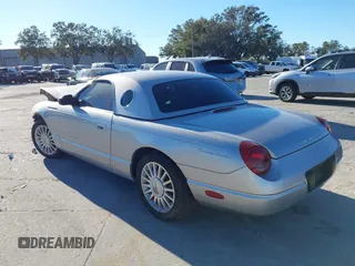 2004 Ford Thunderbird Deluxe with VIN 1FAHP60A84Y100984, listed as a IAAI auction lot 40978553 with 113,051 mi miles. Bid and sale history available at carsss.com. Image 3.