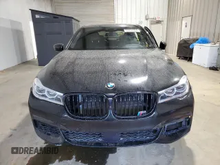 2016 BMW 7 Series 750i with VIN WBA7F0C5XGGL99017, listed as a Copart auction lot 84934504 with 0 mi miles and Salvage Title. Bid and sale history available at carsss.com. Image 5.