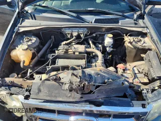 2009 Ford Escape Limited with VIN 1FMCU94G09KC31149, listed as a Copart auction lot 59239045 with 128,851 mi miles and Salvage title. Bid and sale history available at DreamBid. Image 12.