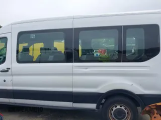 2016 Ford Transit Passenger XL z VIN 1FBZX2CM2GKB51339, wystawiony jako IAAI lot #41429005 z przebiegiem 215 896 mil mil oraz . Historia ofert i sprzedaży dostępna na DreamBid. Obrazek 14.