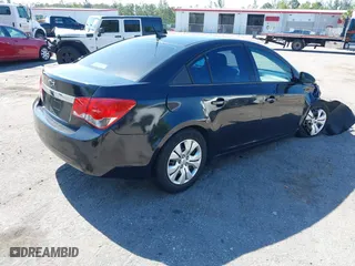 2014 Chevrolet Cruze LS with VIN 1G1PA5SH1E7181211, listed as a IAAI auction lot 41850676 with 128,893 mi miles. Bid and sale history available at carsss.com. Image 4.
