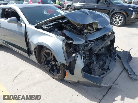 2021 Chevrolet Camaro 1LT z VIN 1G1FB1RX9M0125698, wystawiony jako IAAI lot #41824653 z przebiegiem 69 365 mil mil oraz . Historia ofert i sprzedaży dostępna na DreamBid. Obrazek 18.