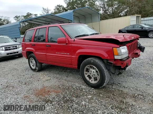 1998 Jeep Grand Cherokee Limited z VIN 1J4GZ78S0WC276411, wystawiony jako Copart lot #78200114 z przebiegiem 220 856 mil mil oraz Szkoda całkowita • Salvage title. Historia ofert i sprzedaży dostępna na DreamBid. Obrazek 11.