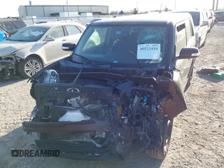 2010 Scion xB with VIN JTLZE4FE8A1113455, listed as a IAAI auction lot 40523410 with 1 mi miles. Bid and sale history available at carsss.com. Image 6.