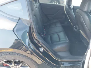 2018 Tesla Model 3 Long Range Battery with VIN 5YJ3E1EA5JF171948, listed as a IAAI auction lot 41993887 with 42,370 mi miles and . Bid and sale history available at DreamBid. Image 8.