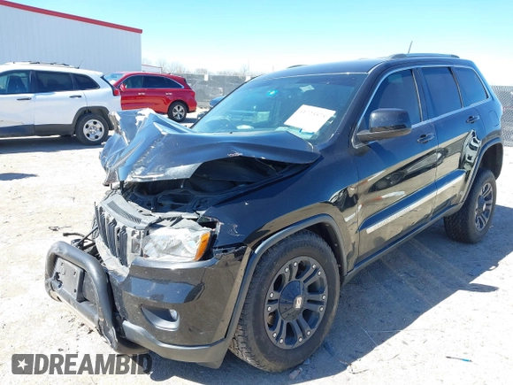 2013 Jeep Grand Cherokee Laredo with VIN 1C4RJFAG2DC643926, listed as a IAAI auction lot 41723575 with 125,048 mi miles. Bid and sale history available at carsss.com. Image 17.