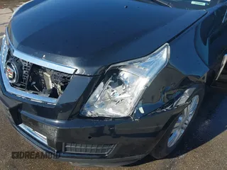 2013 Cadillac SRX Luxury Collection z VIN 3GYFNCE34DS584959, wystawiony jako IAAI lot #42080339 z przebiegiem 133 564 mil mil oraz . Historia ofert i sprzedaży dostępna na DreamBid. Obrazek 6.
