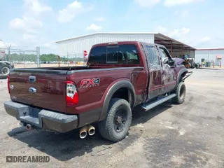 2015 Ford Super Duty F-250 SRW Lariat with VIN 1FT7W2BT6FEA69383, listed as a IAAI auction lot 39604032 with 192,915 mi miles. Bid and sale history available at carsss.com. Image 4.