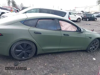 2022 Tesla Model S with VIN 5YJSA1E50NF487306, listed as a IAAI auction lot 41570528 with Not Provided miles and . Bid and sale history available at DreamBid. Image 14.