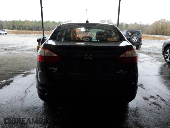2017 Ford Fiesta SE z VIN 3FADP4BJ9HM165523, wystawiony jako Copart lot #70295532 z przebiegiem 91 318 mil mil oraz Szkoda całkowita • Salvage title. Historia ofert i sprzedaży dostępna na DreamBid. Obrazek 6.