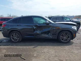 2021 BMW X4 xDrive30i z VIN 5UX2V1C02M9G88260, wystawiony jako IAAI lot #41991270 z przebiegiem 48 817 mil mil oraz . Historia ofert i sprzedaży dostępna na DreamBid. Obrazek 13.