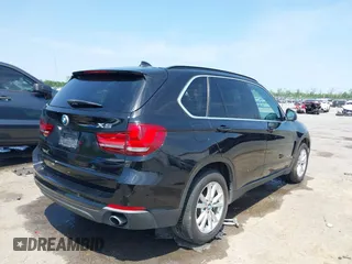 2015 BMW X5 sDrive35i with VIN 5UXKR2C50F0H39042, listed as a IAAI auction lot 42027819 with 152,239 mi miles. Bid and sale history available at carsss.com. Image 4.
