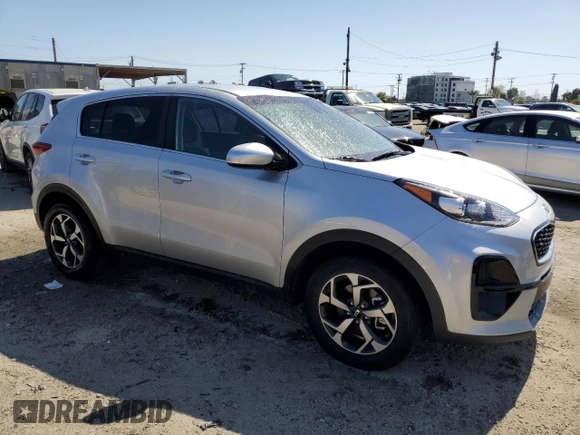 2021 Kia Sportage LX with VIN KNDPM3AC4M7863040, listed as a Copart auction lot 52040075 with 13,233 mi miles and Salvage Title. Bid and sale history available at DreamBid. Image 4.