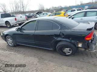 2004 Oldsmobile Alero GX z VIN 1G3NK52F44C107863, wystawiony jako IAAI lot #42018564 z przebiegiem 128 534 mil mil oraz . Historia ofert i sprzedaży dostępna na DreamBid. Obrazek 15.