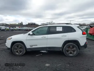 2016 Jeep Cherokee Latitude with VIN 1C4PJMCB8GW282752, listed as a IAAI auction lot 41475436 with 94,257 mi miles. Bid and sale history available at carsss.com. Image 14.