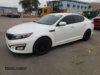 2015 Kia Optima LX z VIN KNAGM4A71F5527446, wystawiony jako Copart lot #60457245 z przebiegiem 190 253 mil mil oraz Czysty tytuł • Clean title. Historia ofert i sprzedaży dostępna na DreamBid. Obrazek 1.