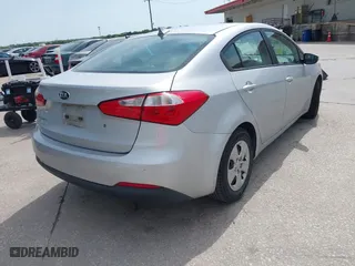 2015 Kia Forte LX with VIN KNAFK4A63F5419676, listed as a IAAI auction lot 42025595 with 137,748 mi miles. Bid and sale history available at carsss.com. Image 4.