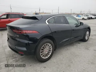 2020 Jaguar I-Pace S z VIN SADHB2S1XL1F80202, wystawiony jako Copart lot #54516864 z przebiegiem 16 405 mil mil oraz . Historia ofert i sprzedaży dostępna na DreamBid. Obrazek 3.