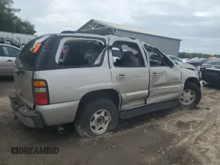 2004 GMC Yukon SLE with VIN 1GKEC13V64J114129, listed as a Copart auction lot 79804154 with 0 mi miles and Salvage Title. Bid and sale history available at carsss.com. Image 3.
