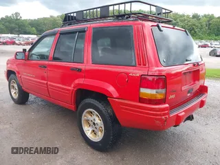 1996 Jeep Grand Cherokee Limited with VIN 1J4GZ78YXTC295872, listed as a IAAI auction lot 42339960 with 265,609 mi miles and . Bid and sale history available at DreamBid. Image 3.