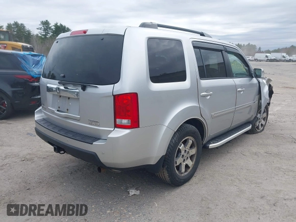 2011 Honda Pilot Touring with VIN 5FNYF4H90BB022354, listed as a IAAI auction lot 41965082 with 126,505 mi miles and . Bid and sale history available at carsss.com. Image 4.