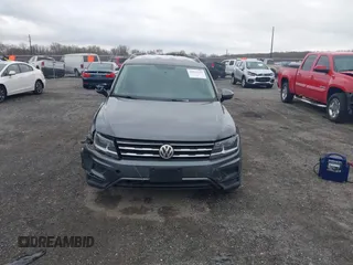 2019 Volkswagen Tiguan S with VIN 3VV0B7AX1KM046808, listed as a IAAI auction lot 41911225 with 62,972 mi miles and . Bid and sale history available at DreamBid. Image 12.