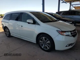 2014 Honda Odyssey Touring с VIN 5FNRL5H94EB110797, выставлен на аукционе Copart как лот 60702365 с пробегом 106 131 миль миль и Списание • Salvage title. История ставок и продаж доступна на DreamBid. Изображение 4.