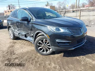 2015 Lincoln MKC with VIN 5LMCJ2A93FUJ42565, listed as a IAAI auction lot 41760265 with 82,812 mi miles. Bid and sale history available at carsss.com. Image 1.