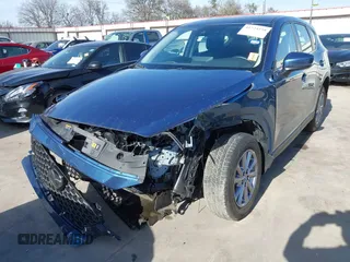 2023 Mazda CX-5 2.5 S with VIN JM3KFBAM4P0281628, listed as a IAAI auction lot 41724158 with 6,013 mi miles. Bid and sale history available at carsss.com. Image 6.
