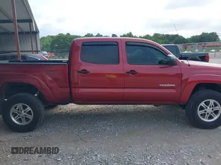 2014 Toyota Tacoma with VIN 3TMMU4FN8EM068048, listed as a IAAI auction lot 42633506 with 126,339 mi miles and . Bid and sale history available at DreamBid. Image 13.