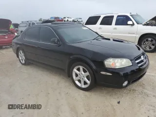 2002 Nissan Maxima GXE z VIN JN1DA31D42T427865, wystawiony jako Copart lot #74374134 z przebiegiem Nie podano mil oraz Szkoda całkowita • Salvage title. Historia ofert i sprzedaży dostępna na DreamBid. Obrazek 4.