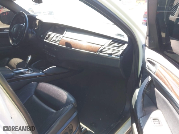 2011 BMW X6 35i with VIN 5UXFG2C58BLX07890, listed as a IAAI auction lot 42067800 with 144,367 mi miles. Bid and sale history available at carsss.com. Image 5.