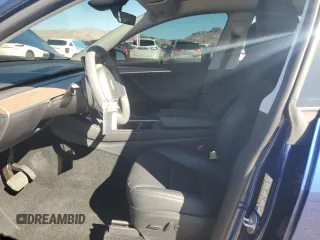 2023 Tesla Model Y Long Range z VIN 7SAYGDEE2PF908622, wystawiony jako Copart lot #47228145 z przebiegiem 10 639 mil mil oraz Szkoda całkowita • Salvage title. Historia ofert i sprzedaży dostępna na DreamBid. Obrazek 7.