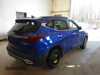 2021 Kia Seltos SX with VIN KNDETCA28M7154385, listed as a IAAI auction lot 41533749 with 34,973 mi miles. Bid and sale history available at carsss.com. Image 4.