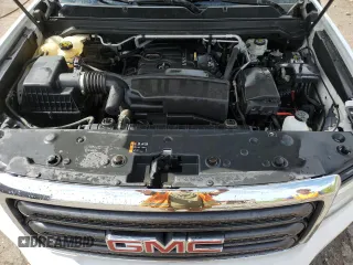 2015 GMC Canyon z VIN 1GTH6AEA7F1163952, wystawiony jako Copart lot #56680505 z przebiegiem 123 025 mil mil oraz Czysty tytuł • Clean title. Historia ofert i sprzedaży dostępna na DreamBid. Obrazek 11.