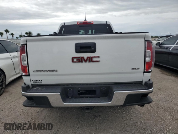2017 GMC Canyon 2WD SLT z VIN 1GTG5DE13H1235684, wystawiony jako Copart lot #74739974 z przebiegiem Nie podano mil oraz Szkoda całkowita • Salvage title. Historia ofert i sprzedaży dostępna na DreamBid. Obrazek 6.