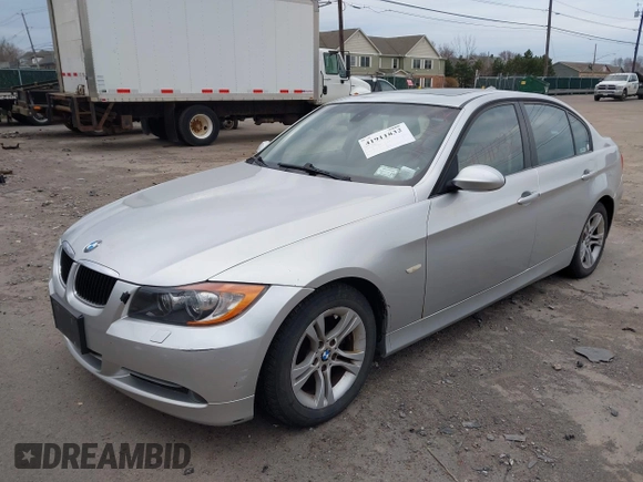 2008 BMW 3 Series 328xi with VIN WBAVC73578KP39571, listed as a IAAI auction lot 41911832 with 130,069 mi miles. Bid and sale history available at carsss.com. Image 2.