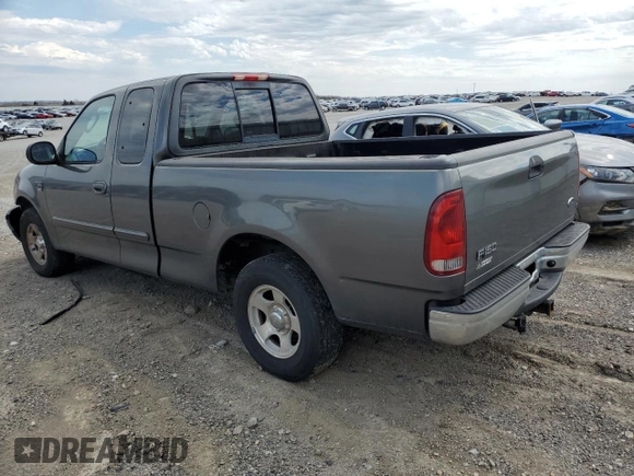 2003 Ford F-150 XL with VIN 1FTRX17L43NA66874, listed as a Copart auction lot 50741395 with 196,161 mi miles and Salvage title. Bid and sale history available at DreamBid. Image 2.