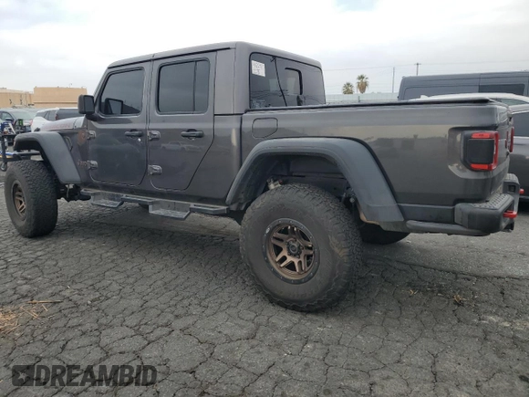 2021 Jeep Gladiator Rubicon with VIN 1C6JJTBG9ML512347, listed as a Copart auction lot 43197415 with 134,608 mi miles and Salvage title. Bid and sale history available at DreamBid. Image 2.