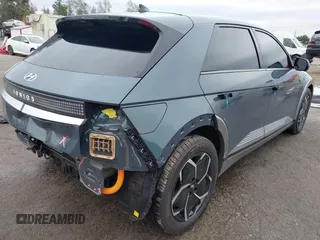 2024 Hyundai Ioniq 5 Limited z VIN KM8KR4DE4RU310424, wystawiony jako IAAI lot #41761478 z przebiegiem 4 027 mil mil oraz . Historia ofert i sprzedaży dostępna na DreamBid. Obrazek 4.