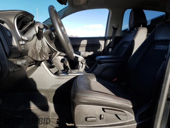 2017 GMC Canyon 4WD SLE with VIN 1GTG6CENXH1254503, listed as a Copart auction lot 46796135 with 80,458 mi miles and Salvage Title. Bid and sale history available at carsss.com. Image 7.