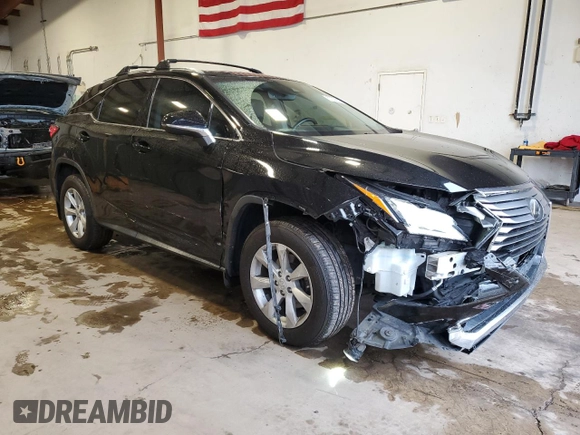 2016 Lexus RX 350 with VIN 2T2BZMCA3GC001679, listed as a Copart auction lot 57070835 with 74,729 mi miles and Salvage Title. Bid and sale history available at DreamBid. Image 4.