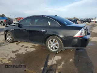 2008 Ford Taurus Limited with VIN 1FAHP25W38G181594, listed as a Copart auction lot 79701014 with 129,968 mi miles and Salvage Title. Bid and sale history available at carsss.com. Image 2.