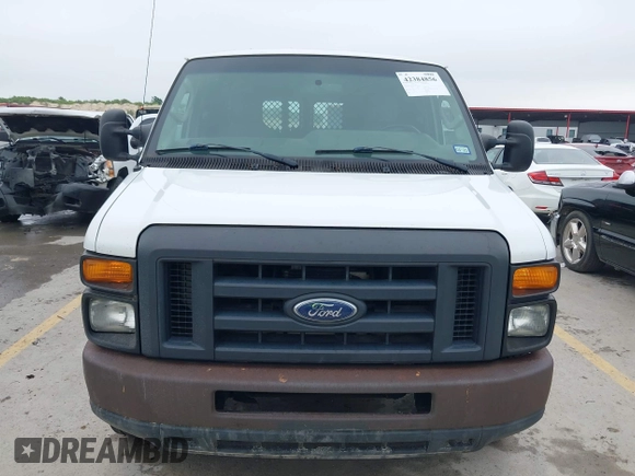 2014 Ford Econoline Cargo Commercial z VIN 1FTNE2EW7EDA00870, wystawiony jako IAAI lot #42384856 z przebiegiem 156 312 mil mil oraz . Historia ofert i sprzedaży dostępna na DreamBid. Obrazek 12.