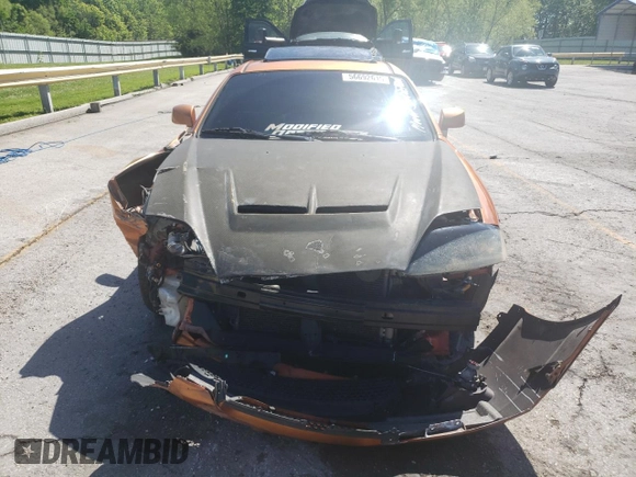 2006 Hyundai Tiburon GT z VIN KMHHN65F66U191134, wystawiony jako Copart lot #56692615 z przebiegiem 197 093 mil mil oraz Szkoda całkowita • Salvage title. Historia ofert i sprzedaży dostępna na DreamBid. Obrazek 5.