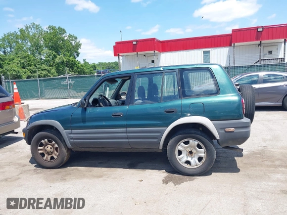 1998 Toyota RAV4 with VIN JT3GP10V6W0023680, listed as a IAAI auction lot 42235877 with 244,446 mi miles and . Bid and sale history available at DreamBid. Image 13.