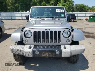 2014 Jeep Wrangler Unlimited Sahara with VIN 1C4BJWEG8EL236951, listed as a Copart auction lot 61046575 with 146,642 mi miles and Salvage title. Bid and sale history available at DreamBid. Image 5.
