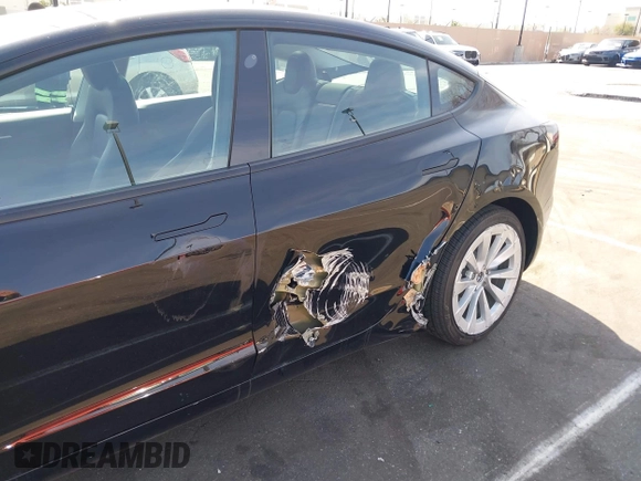 2022 Tesla Model 3 Long Range with VIN 5YJ3E1EB1NF133356, listed as a IAAI auction lot 41568303 with 73,406 mi miles and . Bid and sale history available at DreamBid. Image 6.