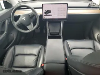 2021 Tesla Model Y Long Range with VIN 5YJYGDEEXMF079324, listed as a Copart auction lot 52991545 with 0 mi miles and Salvage Title. Bid and sale history available at carsss.com. Image 8.