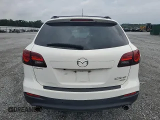 2014 Mazda CX-9 Touring with VIN JM3TB3CVXE0443089, listed as a Copart auction lot 64545195 with 121,229 mi miles and Clean title. Bid and sale history available at DreamBid. Image 6.